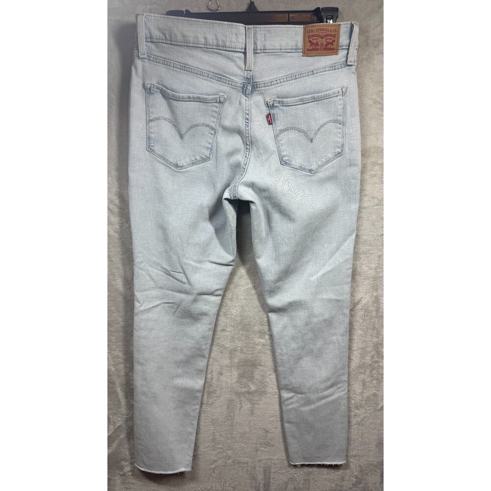 Levi’s 311 Shaping Skinny Jeans Womens 29 Light Blue Wash Raw Hem Stretch Denim